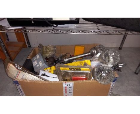 A box of miscellaneous old tools and garden lights 