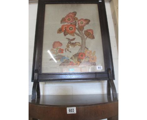 A tapestry fire screen