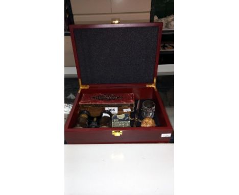 A box of miscellaneous items including opera glasses, boxed compass, Sir Malcom Campbell Flick book, Boxed homer super chromo
