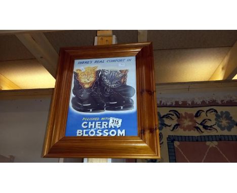A pine framed Cherry Blossom advertising print of cats