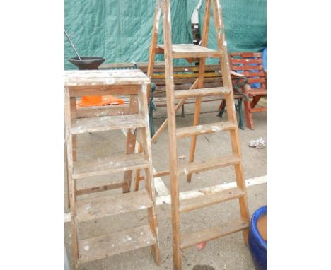 2 wooden step ladders