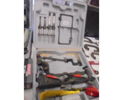 A cased set of tools etc.,