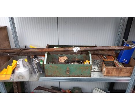 A shelf of tools including large pry bars COLLECT ONLY