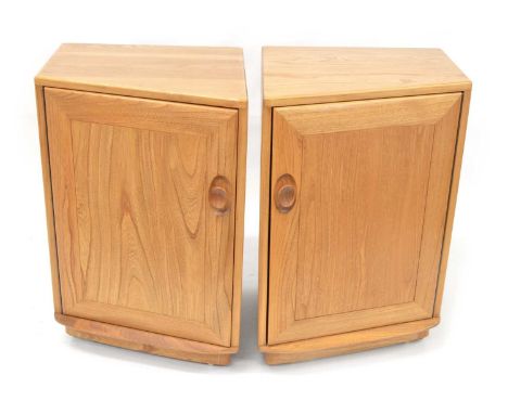 Ercol  Two golden elm cabinets No.1012, designed primarily to function as extensions to each end of a sideboard.44.5cm wide, 