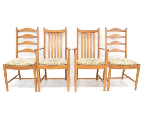 Ercol  Four golden elm dining chairs Including two Penn carvers, model no. 1138, and two ladder back dining chairs, model no.