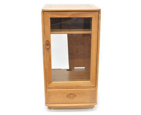 Ercol  "Windsor" golden elm Hi-Fi cabinet Model 1073b, glazed cupboard door enclosing a single shelf over single drawer on a 