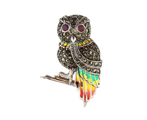 A plique a jour enamel, ruby and marcasite brooch in Sterling silver designed as an owl with ruby set eyes, a marcasite body 