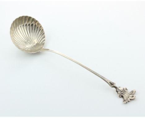 An unusual antique George IV Sterling Silver soup ladle by William Chawner, London 1821. With scalloped shell bowl and flat c