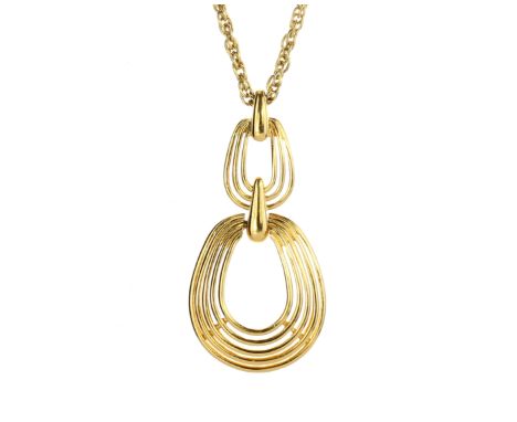 TRIFARI A vintage yellow metal pendant and chain by Trifari, designed as two graduated ovals wire motifs on a twisted curb ch
