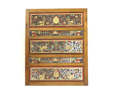 A decorative wooden peranakan screen, the four panels set in a frame, with carved and pierced lotus and scrolling foliage, bi