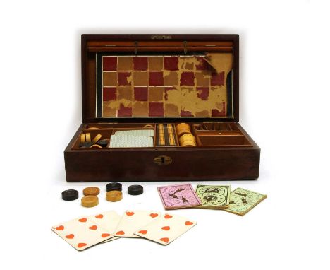 A 19th century mahogany cased games compendium, complete with chess, draughts, cards and horse racing39cm wide x 22cm deep x 