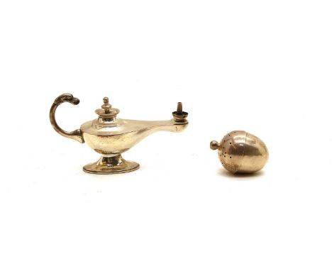 An Edwardian silver 'Aladdin' lamp cigar lighter by Asprey &amp; Co., Birmingham 1912, with an eagle head handle, 2.3 ozt,12c