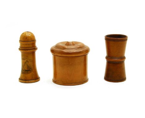 A treen fruitwood dice shaker, 8.5cm high, and a treen fruitwood powder box and cover, with mother of pearl inlay, 8cm high, 