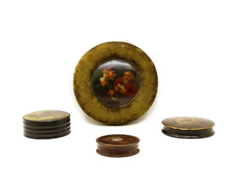 A Stobwasser style papier-mâché pot lid, decorated with two men playing cards, together with a papier-mâché patch pot with pa