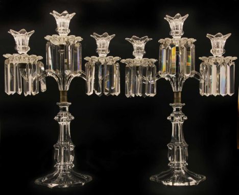 A pair of 19th century cut glass three light two branch table lustres, 34cm wide x 51cm high (2)Condition report: Three lustr