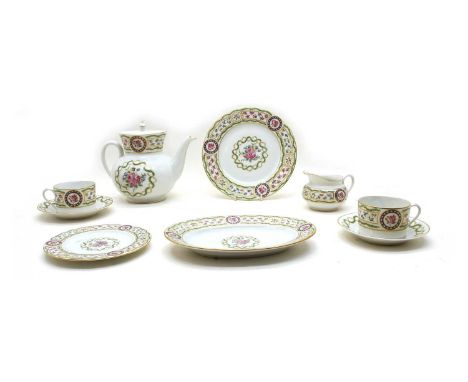 A Haviland Limoges 'Louveciennes' tea set, comprising; a teapot and cover, a milk jug, six cups and saucers, 6 tea plates (16