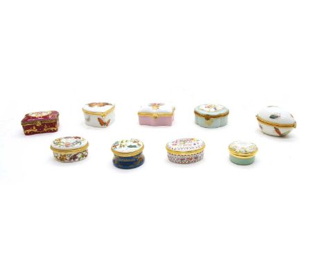 Nine modern enamel and porcelain trinket boxes, comprising: five porcelain, by Limoges, including insects, basket of flowers,