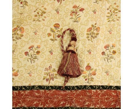 A pair of lined and interlined curtains, each decorated with floral designs with cut velvet edges, 350cm wide, 260cm drop, to