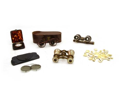 Two pairs of mother of pearl opera glasses, a tortoiseshell cased travelling clock and two pairs of glassesCondition report: 