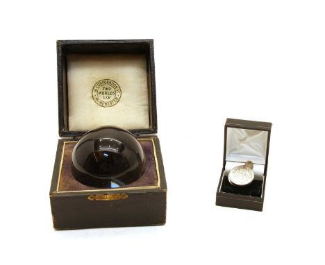 'Bravingtons for rings', a ring sizer (1901-1910) and a cased crystal ball by 'Two Worlds Ltd', c.1900 in original box (2)Con