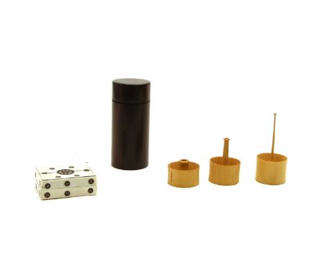 An ebony and nickel mounted cylindrical cotton holder, by R Kell, maker, no 151, containing three lift out sections, 4.25cm d