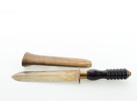the steel blade stamped maker's mark, over a turned ebonised handle, with heavy brass scabbard  35cm long  Knife is genuine.