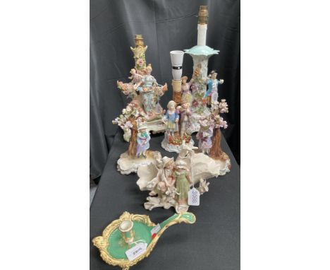 A group of Continental figural china, including a Sitzendorf candlestick, two other figural candlesticks, a pair of Sitzendor