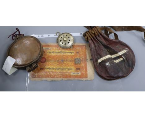 A group of Tibetan objects, including a flint lighter, a bullet bag, two pendants, a relic box and three banknotesProvenance 