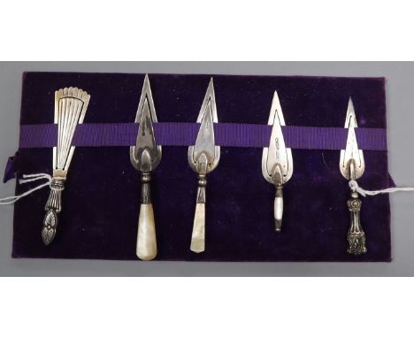 Five Victorian and later silver or white metal bookmarks, including four 'trowel' and one fan-shaped example