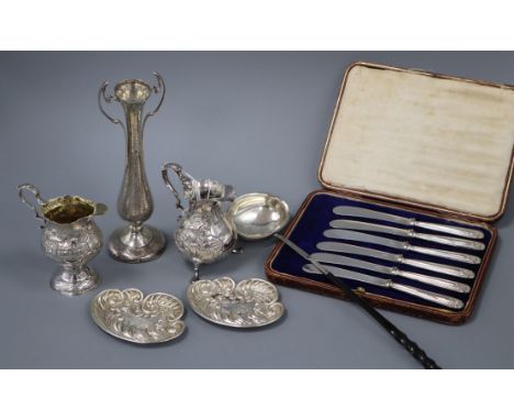 Two 18th century late embossed silver cream jugs, a silver toddy ladle, Art Nouveau vase, pair of pin trays and cased set of 