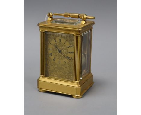 A late 19th century French bass cased eight day striking carriage clock 12cm high