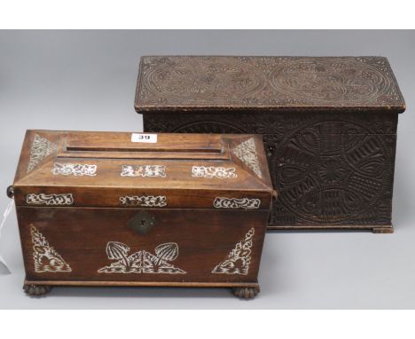 A Victorian carved wood tea caddy and a mother of pearl inset rosewood tea caddy longest 37cm