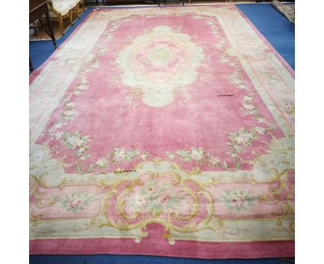 A Donegal Savonnerie pattern pink ground carpet 615 x 345cm