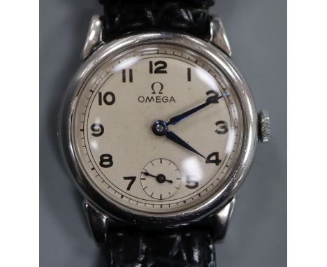 A gentleman's 1930's stainless steel Omega manual wind mid-size wrist watch, with Arabic dial and subsidiary seconds, movemen