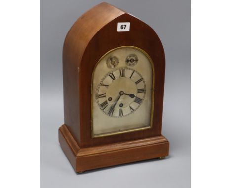 A mahogany lancet shaped mantel clock height 41cm