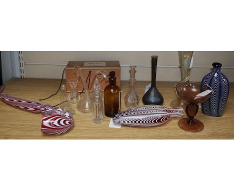 A collection of decorative glassware, including a Nailsea swirled pipe, flask and vase, a similar reproduction blue and white