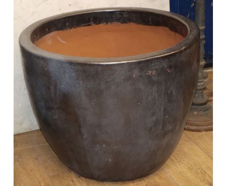 A gun metal glazed garden planter W.60cm