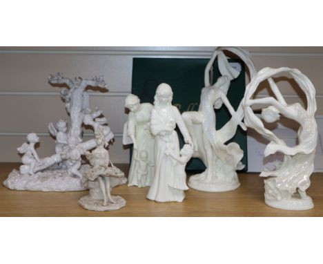 A group of blanc de chine figures, including a Belleek lithophane plaque, 'The Water Carrier' (boxed), a Continental group of