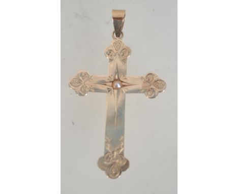 A  Victorian 14ct gold crucifix with engraved decoration and central mounted pearl. Tests 14ct gold . Measures 4cms. Weight 2