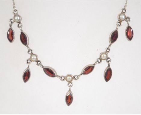 A 925 silver garnet glass and pearl festoon necklace. Marked 925. Measures 18 inches. Weight 12.5g