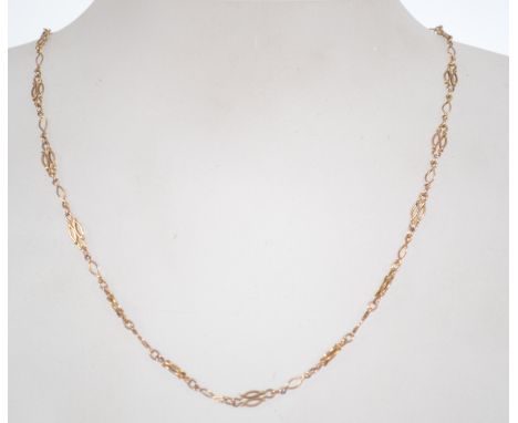 A vintage ladies 9ct gold fancy link necklace with barrel clip clasp. Length 42cms / weight 4.2g. Tests 9ct gold.