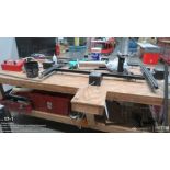 4ft X 8ft work table set up for screen frame making including contents with tools, adhesives, stret