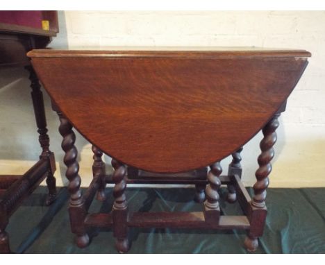 A Small Oak Gate Legged Drop Leaf Barley Twist Occasional Table. 