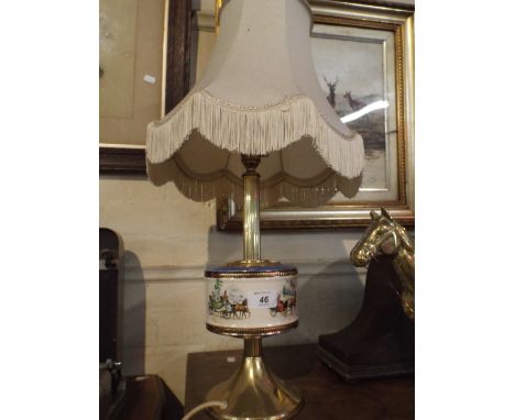 A Brass and Ceramic Table Lamp Decorated with Coaching Scenes.