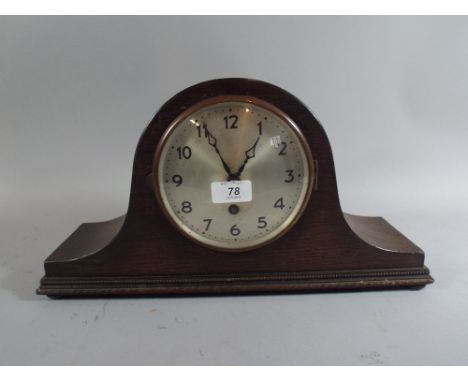 An Oak Mantle Clock.