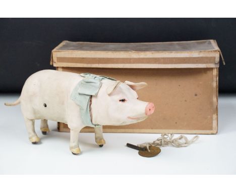 Early 20th C Roulet et Decamps clockwork walking pig automaton, glass eyes, with original blue bow and key, housed within box