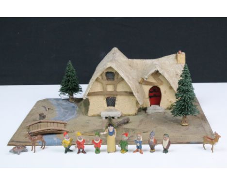 Scarce Britains Disney Snow White and the Seven Dwarfs cottage and base 1659 set by Hugar Scale Models Ltd with Snow White an