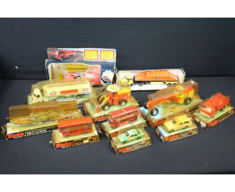 11 Boxed diecast models to include 9 x Dinky featuring 945 AEC Fuel Tanker ESSO, 973 Eaton Vale Articulated Tractor Shovel, 2
