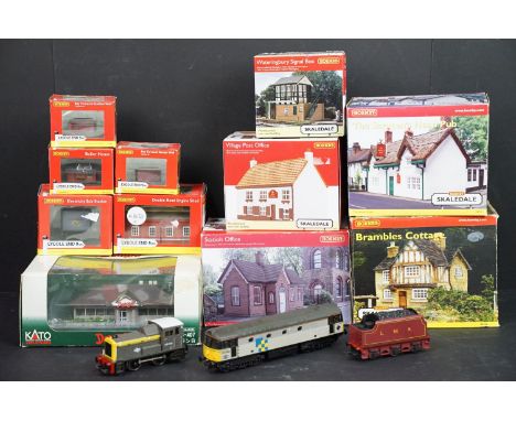 Two OO gauge locomotives to include Lima 33042 Diesel and Hornby BR 0-4-0 06008 plus 11 x trackside buildings featuring 5 x H