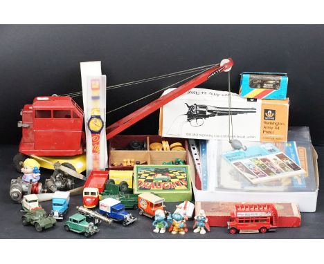 Quantity of various toys to include red Triang Jones KL44 Crane, 3 x Peyo / Schleich Smurfs figures, boxed Winfield Remington